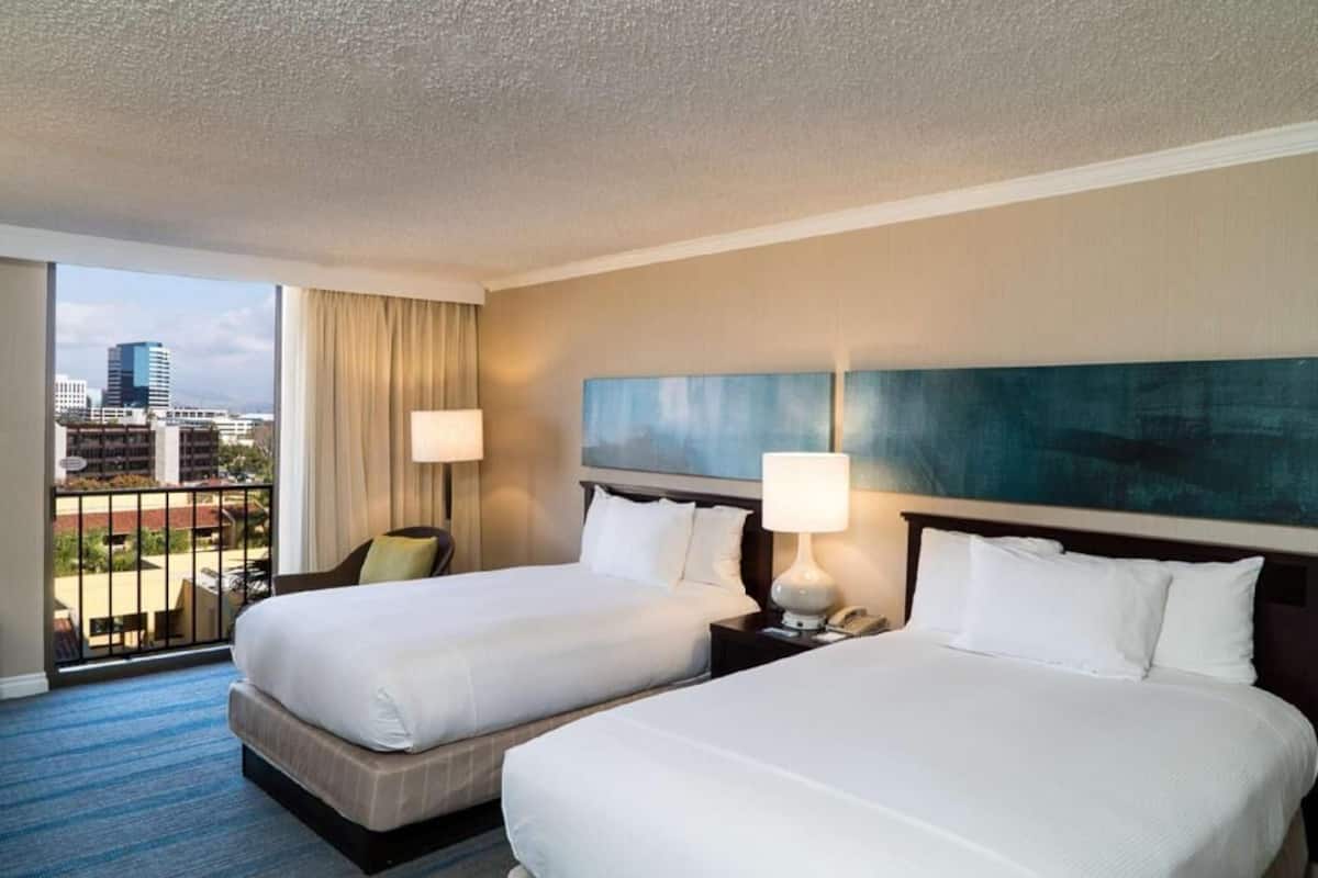 Premium bedding, pillowtop beds, in-room safe, desk