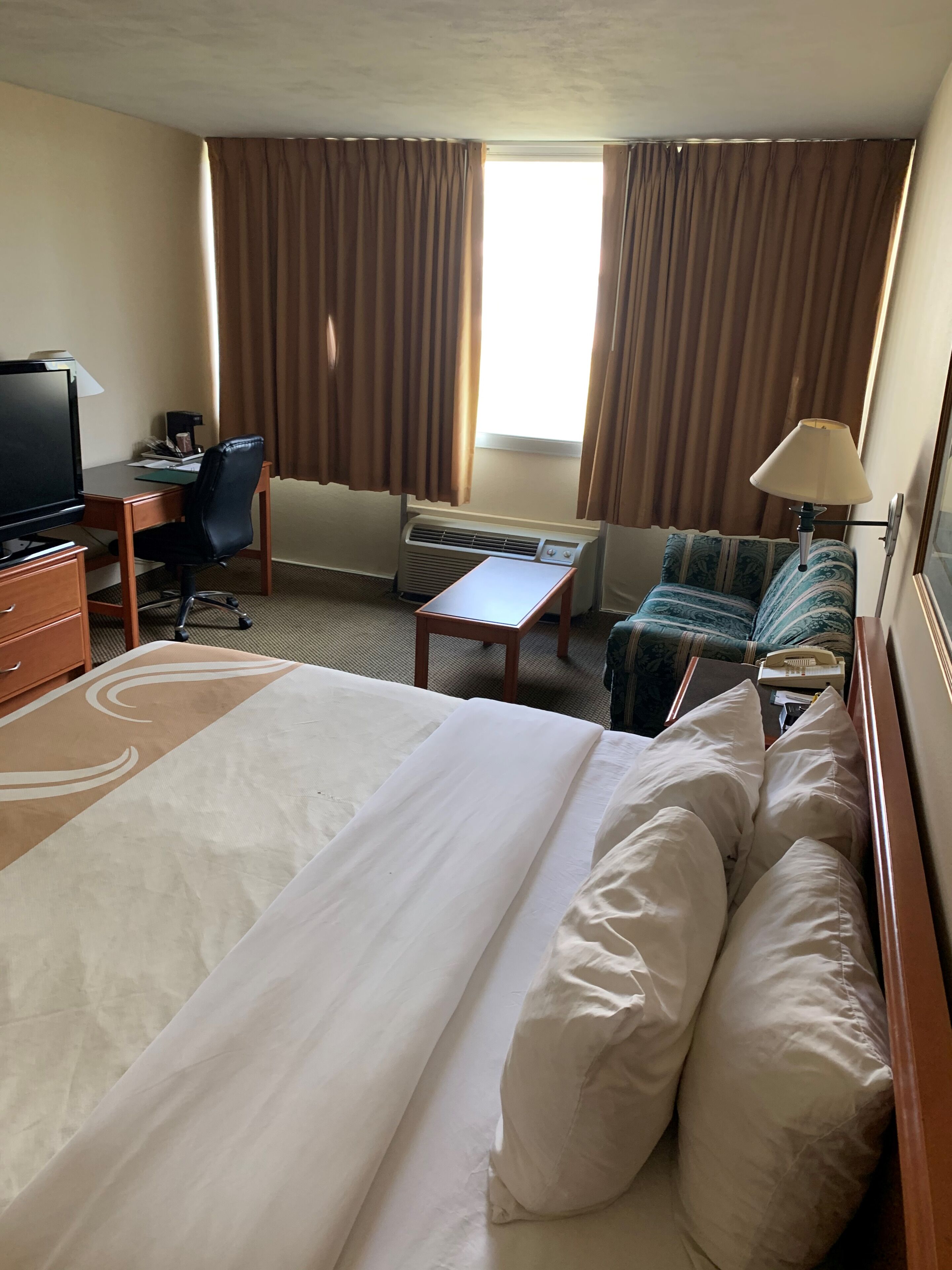 Premium bedding, desk, blackout curtains, iron/ironing board