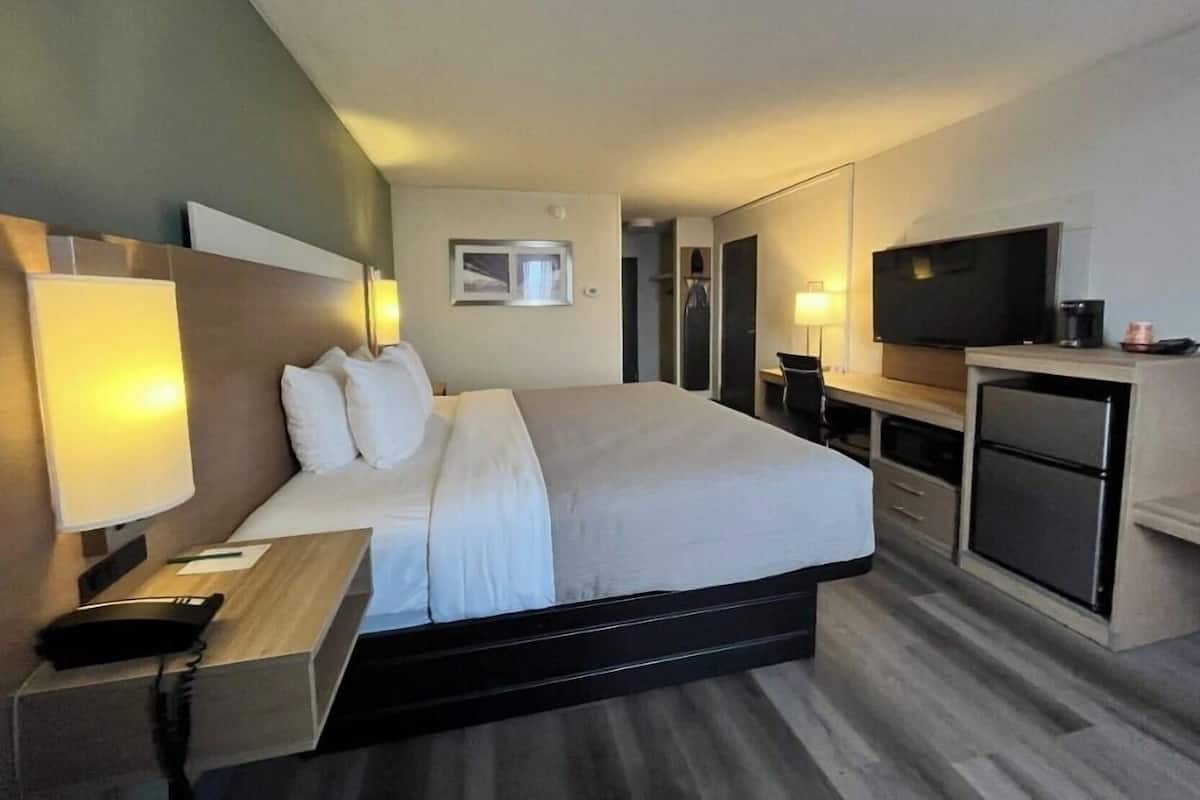 Premium bedding, desk, blackout drapes, iron/ironing board