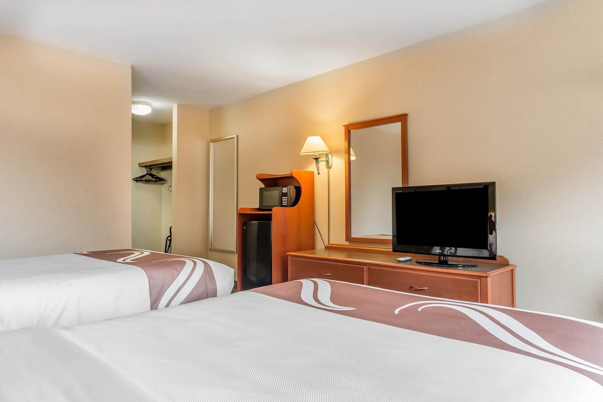 Premium bedding, desk, blackout curtains, iron/ironing board