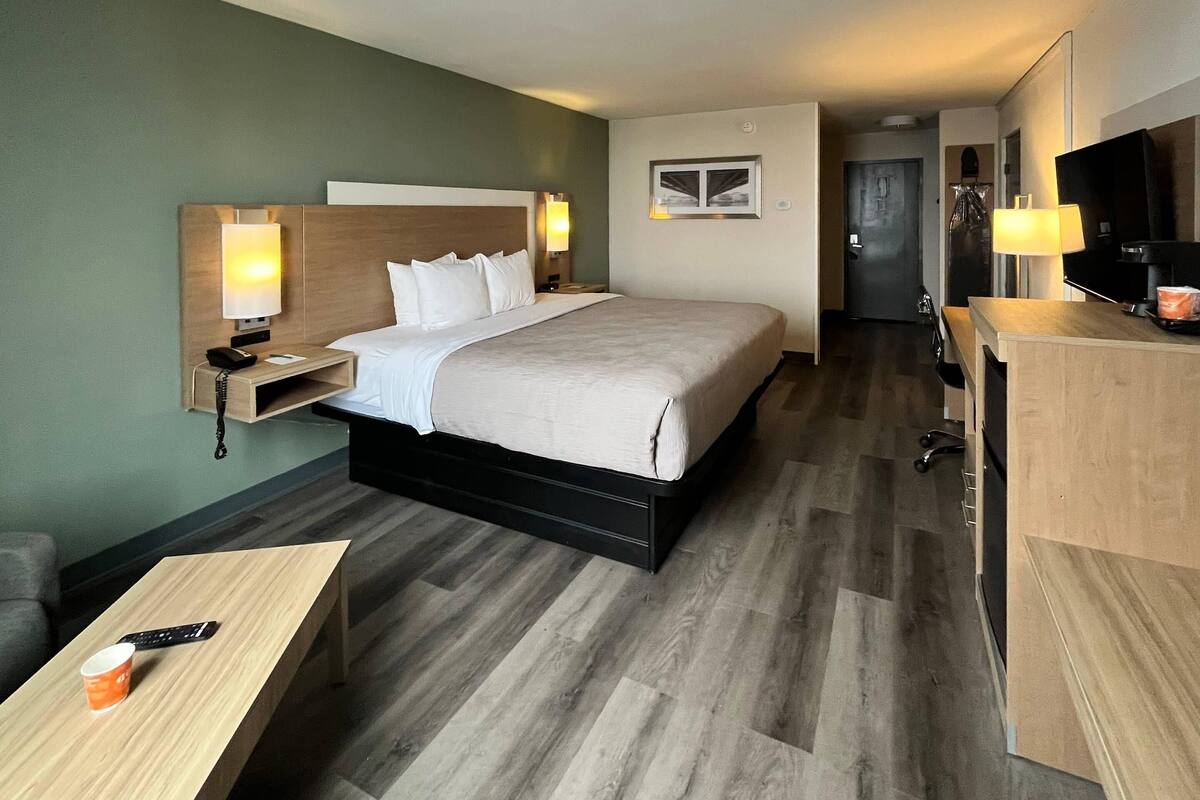 Premium bedding, desk, blackout drapes, iron/ironing board