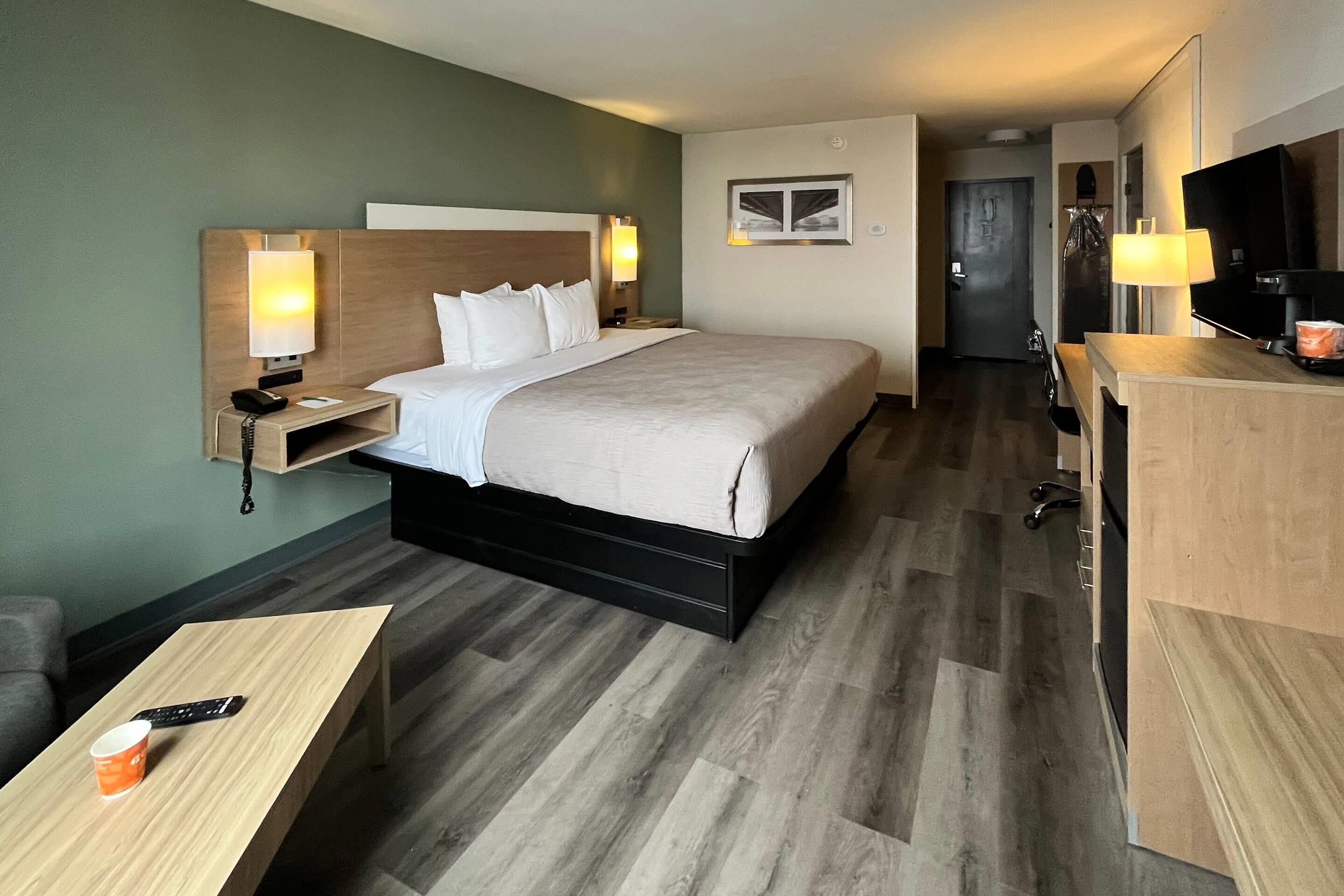 Premium bedding, desk, blackout curtains, iron/ironing board