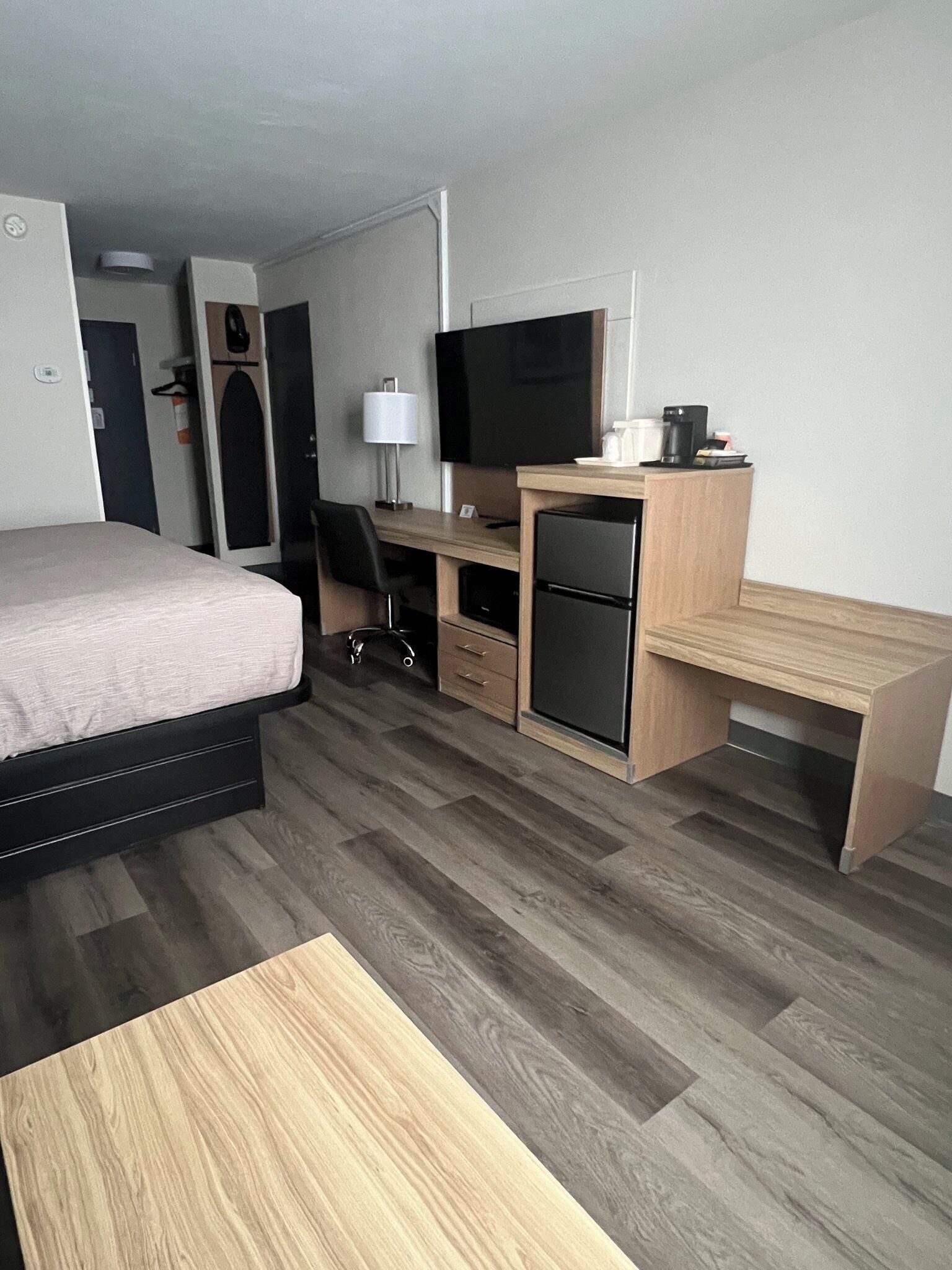 Premium bedding, desk, blackout drapes, iron/ironing board
