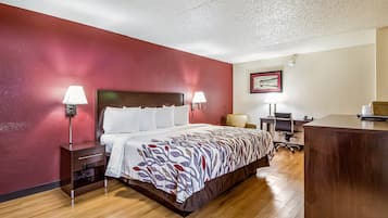 Desk, laptop workspace, blackout drapes, free cribs/infant beds