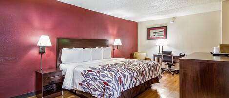 Desk, laptop workspace, blackout drapes, free cribs/infant beds