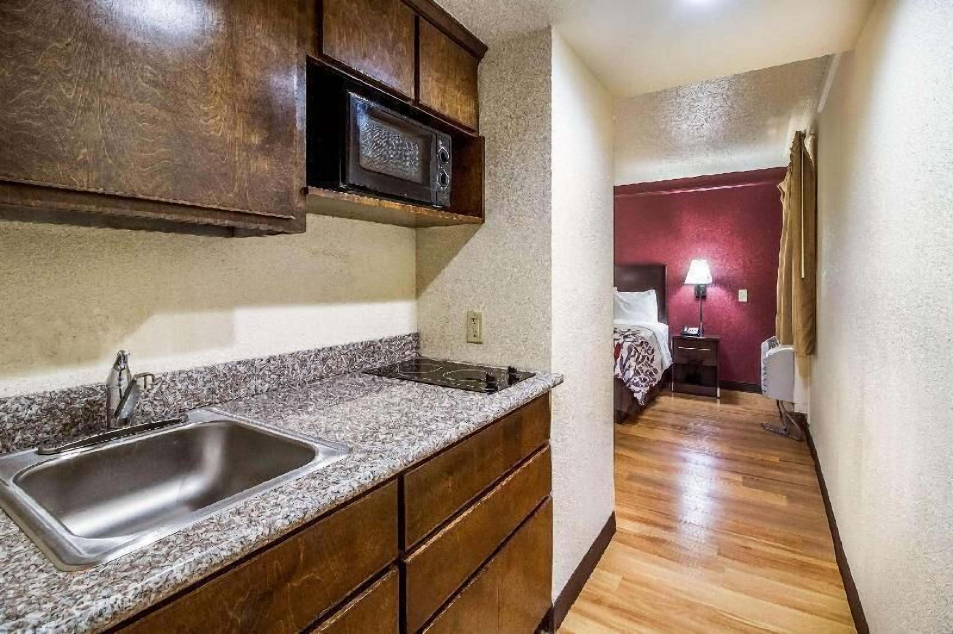 Desk, laptop workspace, blackout curtains, free cots/infant beds