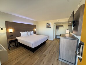 Quarto, 1 cama King, para não fumantes | Cortinas blackout, ferros/tábuas de passar roupa, Wi-Fi de cortesia