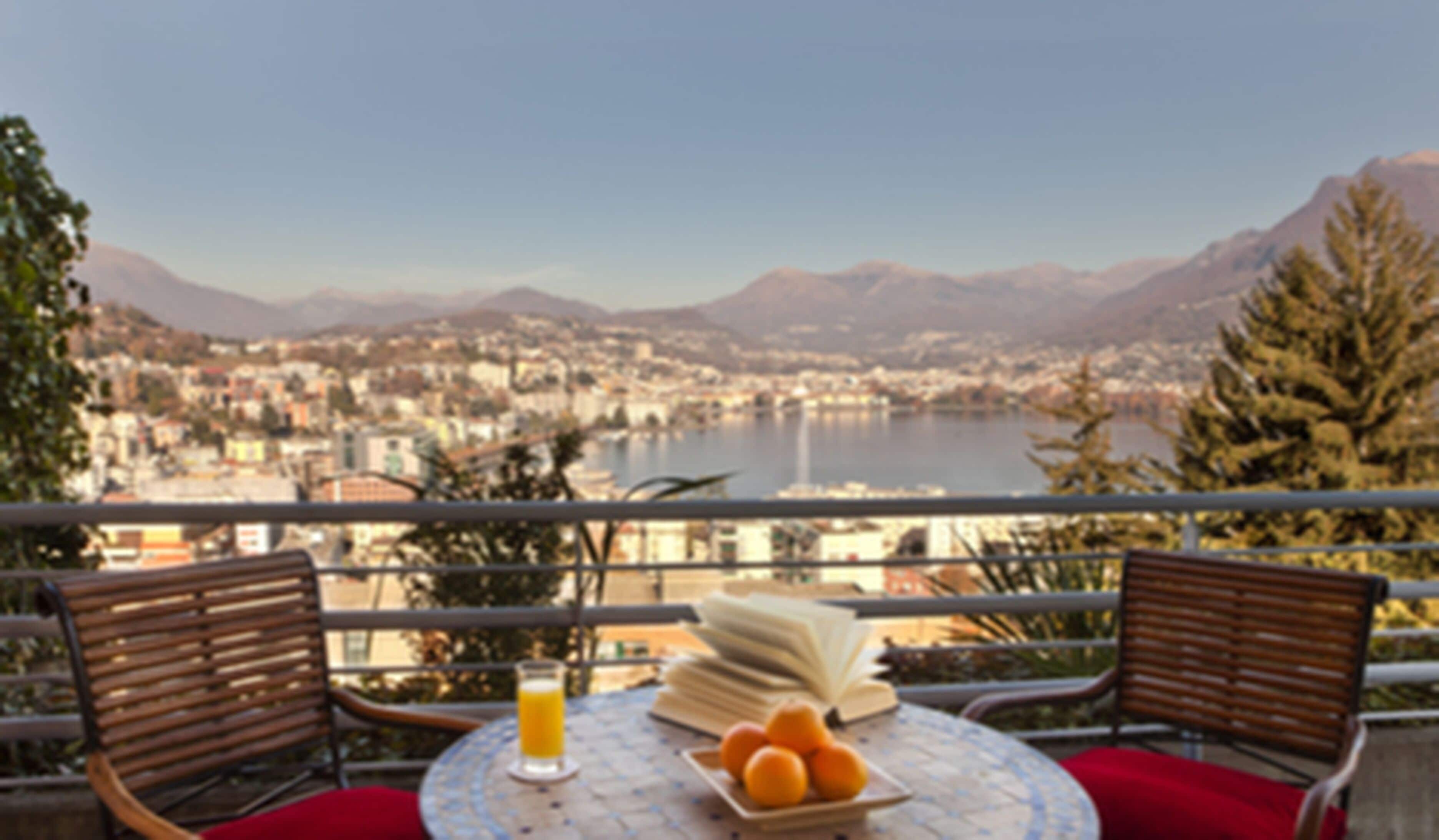 deluxe double room, lake view | hypo-allergenic bedding, in-room safe, desk, iron/ironing board