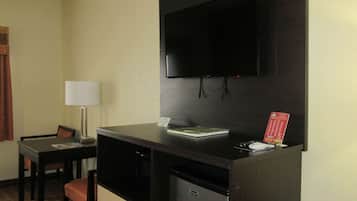 Desk, laptop workspace, blackout curtains, iron/ironing board