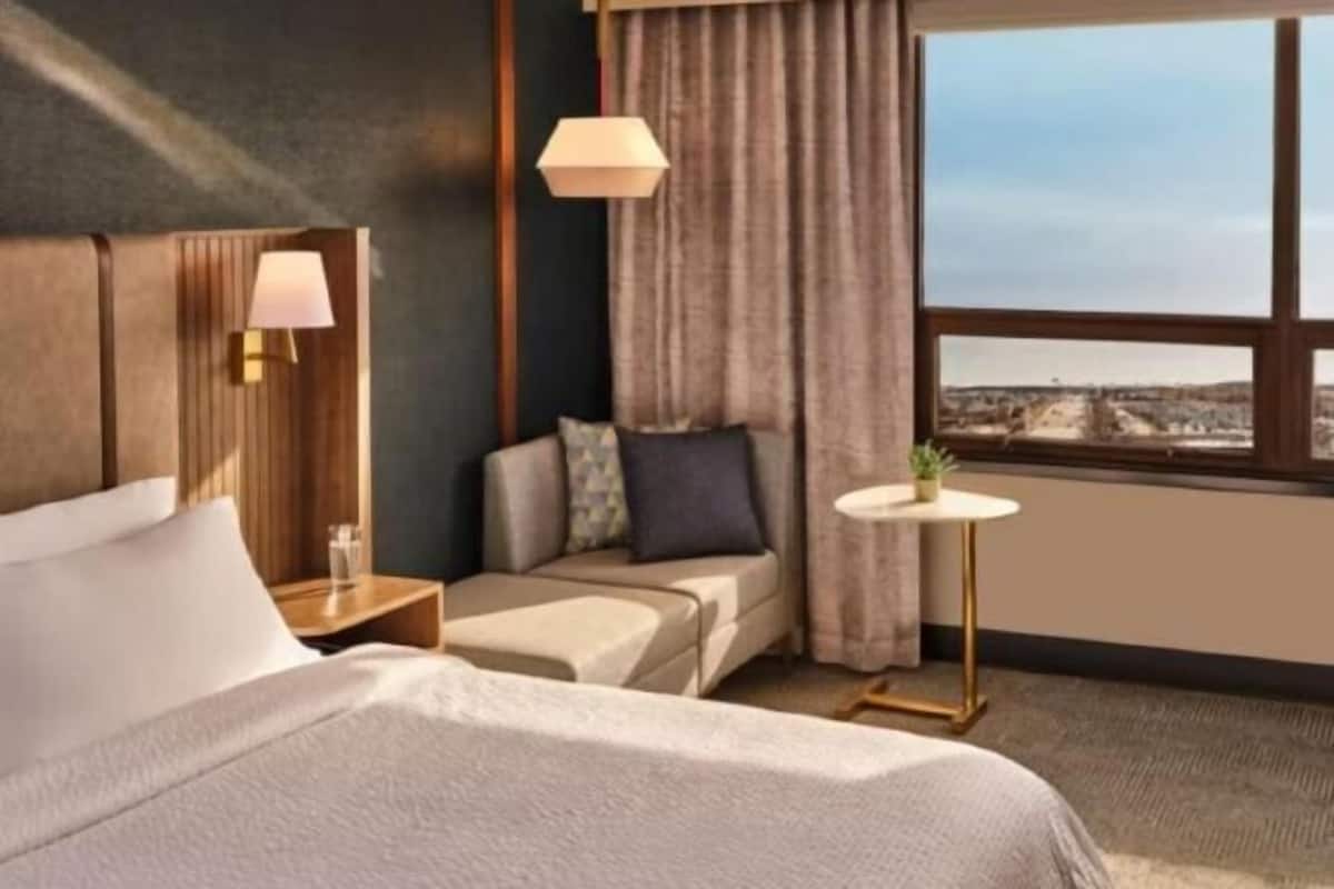 Premium bedding, down comforters, Tempur-Pedic beds, desk