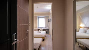 Habitació triple econòmica | Llençols italians de la marca Frette i roba de llit d'alta qualitat