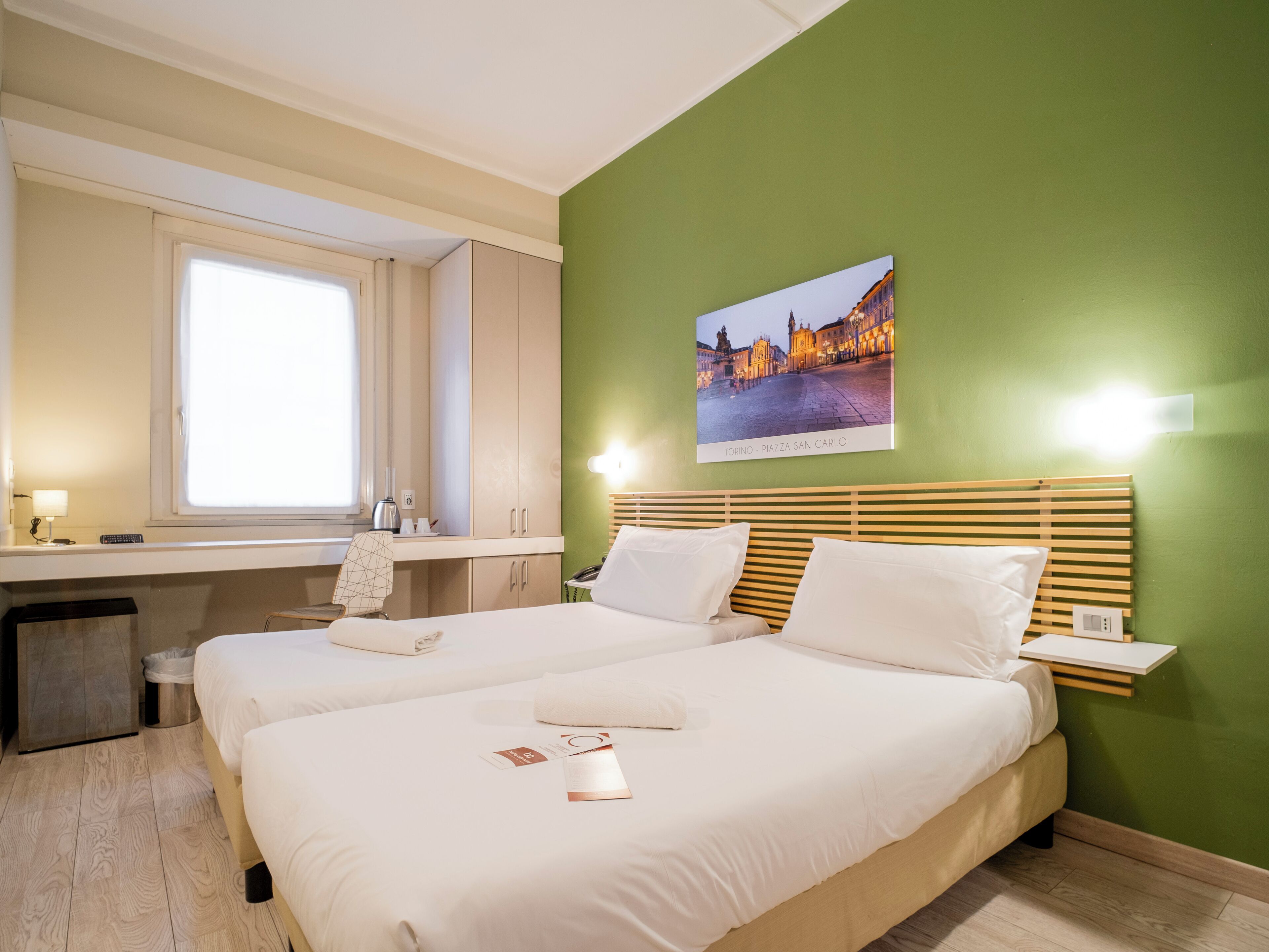 twin room | frette italian sheets, premium bedding, down duvets, minibar