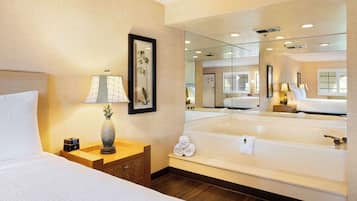 Combined shower/tub, designer toiletries, hair dryer, towels