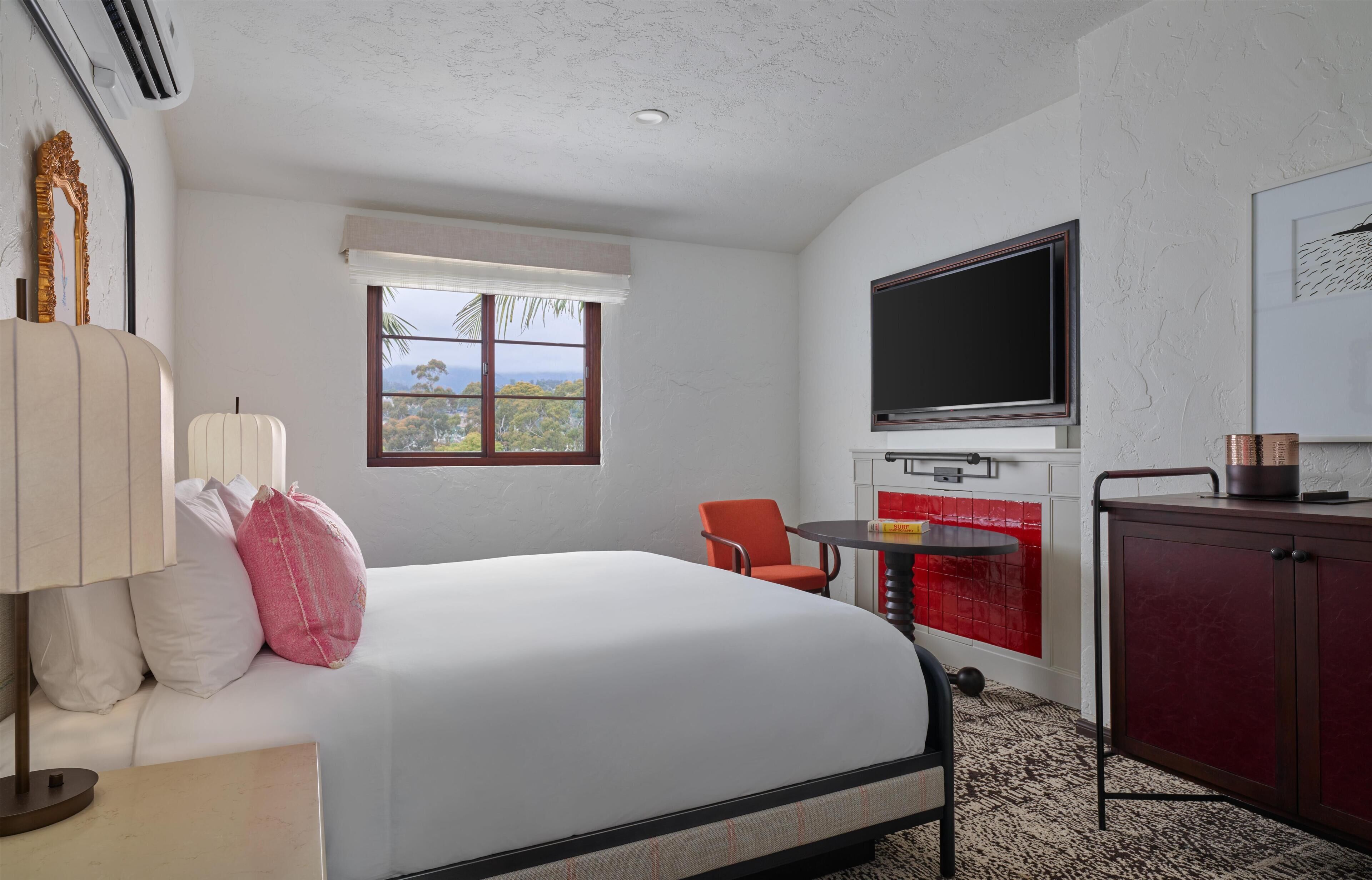Premium bedding, down comforters, pillowtop beds, in-room safe