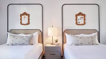 Premium bedding, down duvets, pillow-top beds, in-room safe