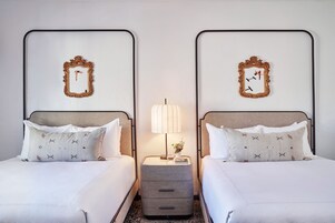 Premium bedding, down duvets, pillow-top beds, in-room safe