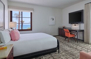 Premium bedding, down comforters, pillowtop beds, in-room safe