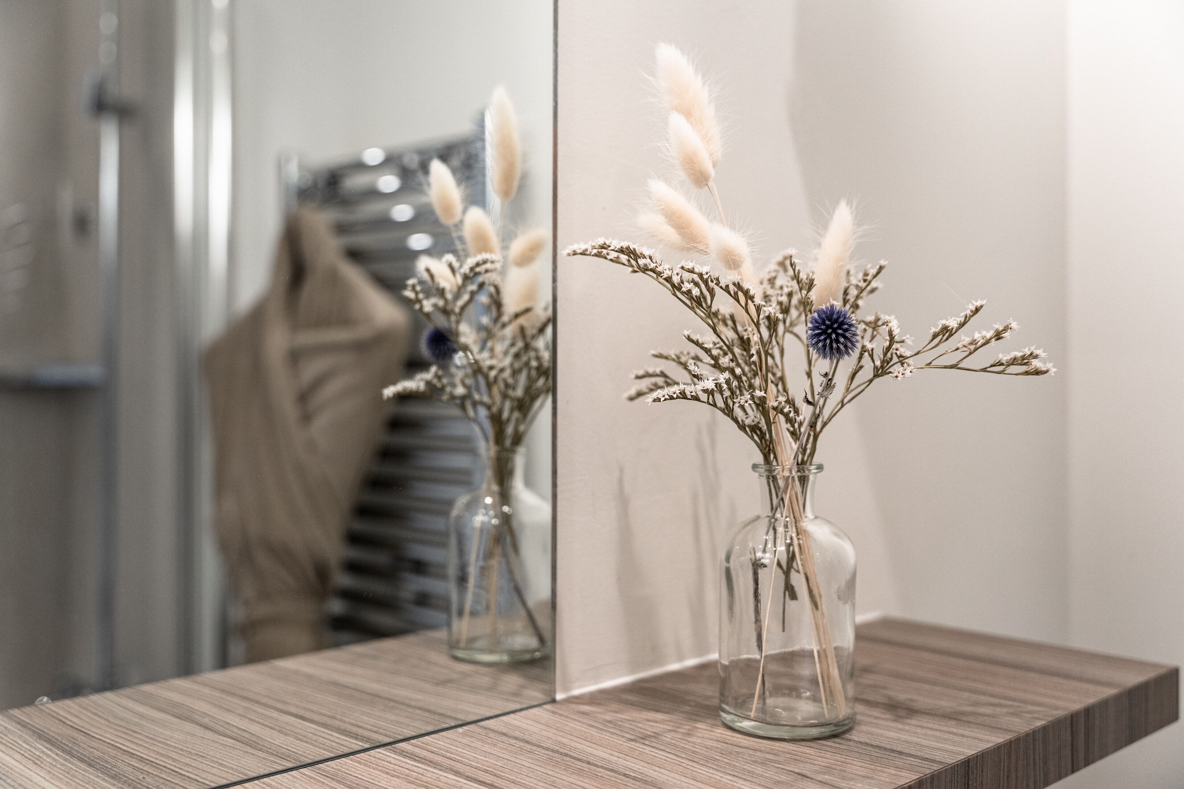 rainfall showerhead, designer toiletries, hair dryer, bathrobes