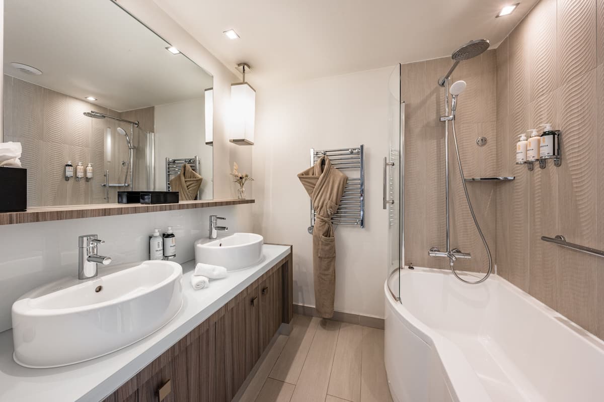 sofitel suite sea view two singles or a large bed any floor terrace | bathroom | rainfall showerhead, designer toiletries, hair dryer, bathrobes