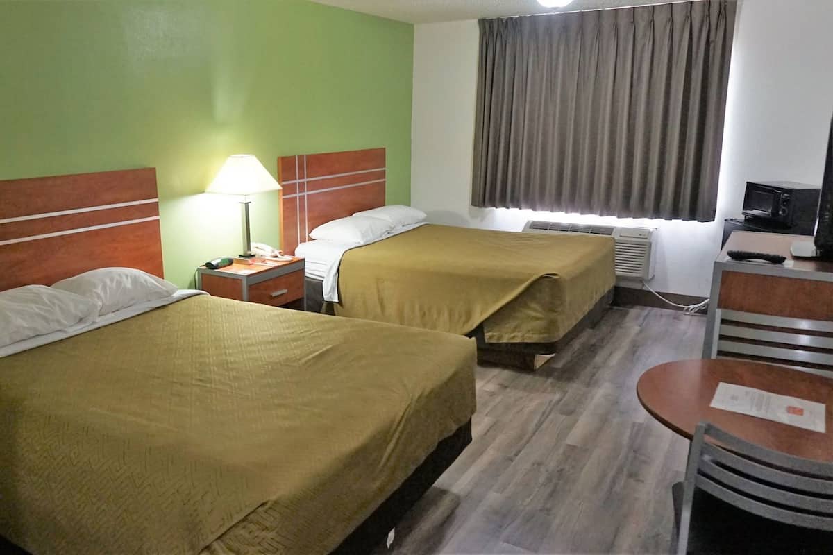 Blackout curtains, iron/ironing board, rollaway beds, free WiFi