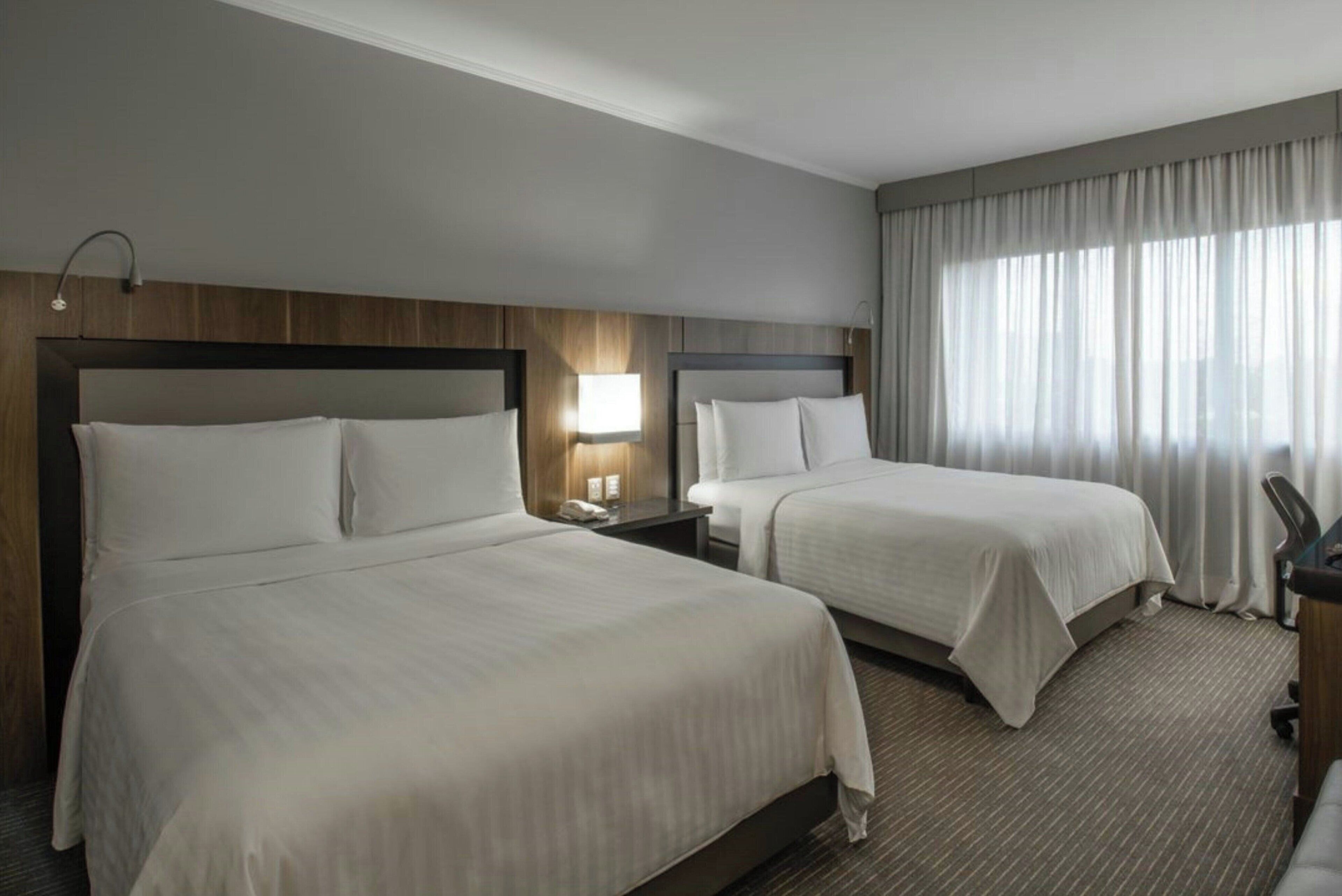 Executive Room, 2 Double Beds | Premium bedding, minibar, in-room safe, desk