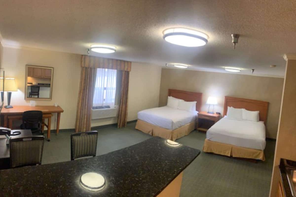 Suite, 2 Queen Beds, Non Smoking, Refrigerator & Microwave | Pillowtop beds, desk, laptop workspace, iron/ironing board