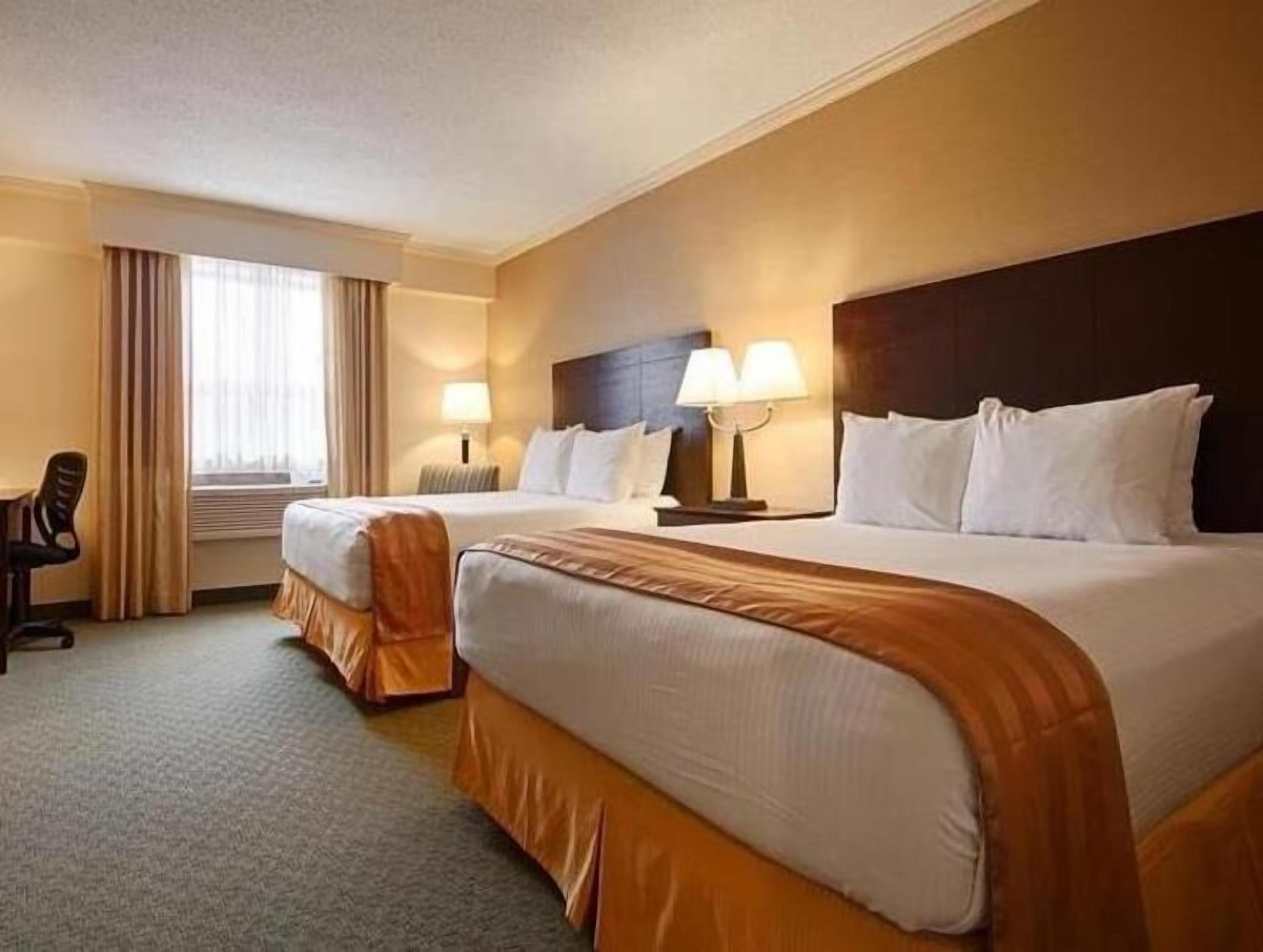 Pillowtop beds, desk, laptop workspace, iron/ironing board