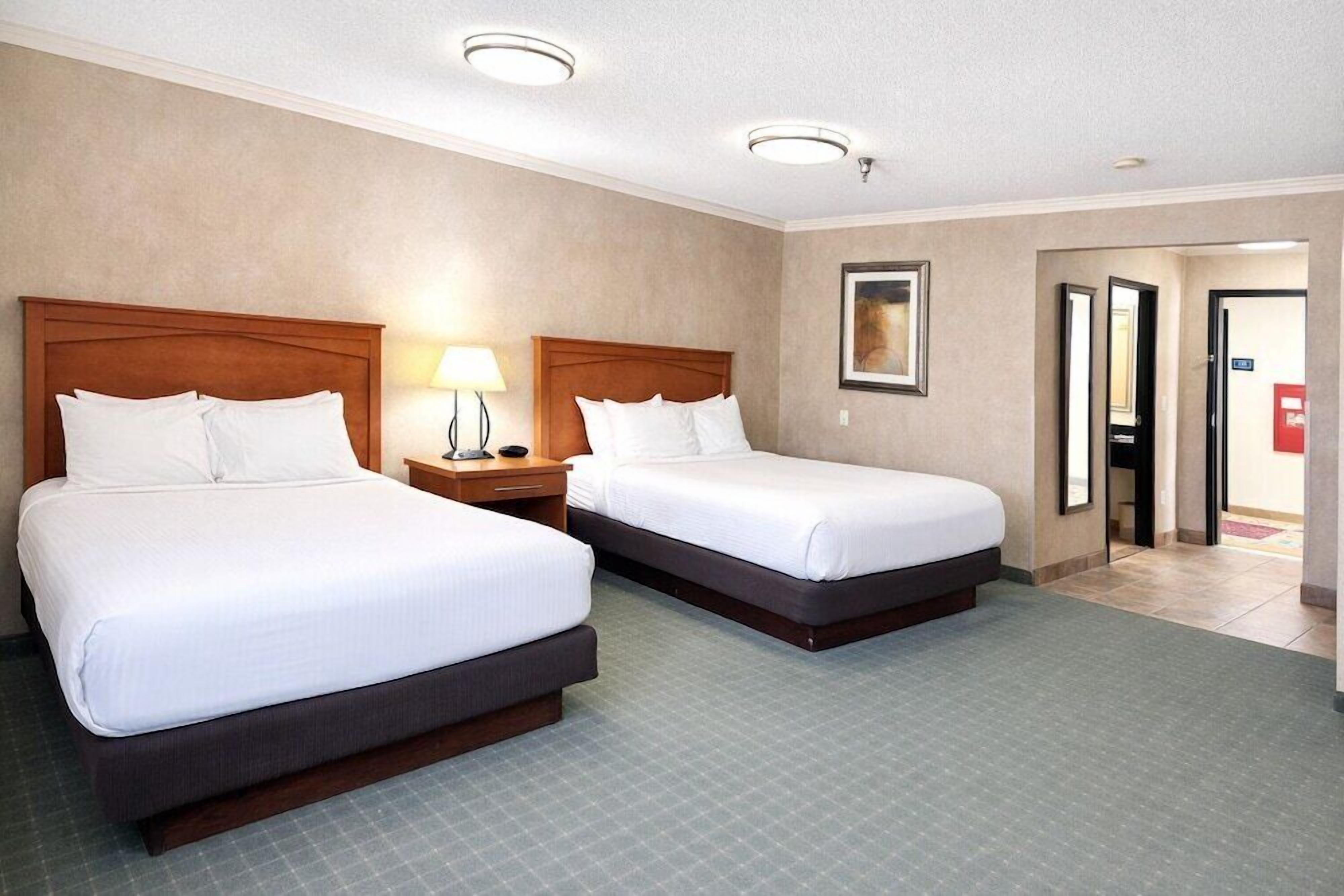 Pillowtop beds, desk, laptop workspace, iron/ironing board