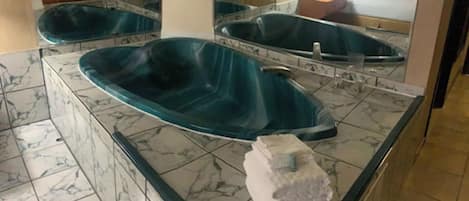 Suite, 1 King Bed, Non Smoking, Jetted Tub (with Sofabed) | Pillowtop beds, desk, laptop workspace, iron/ironing board