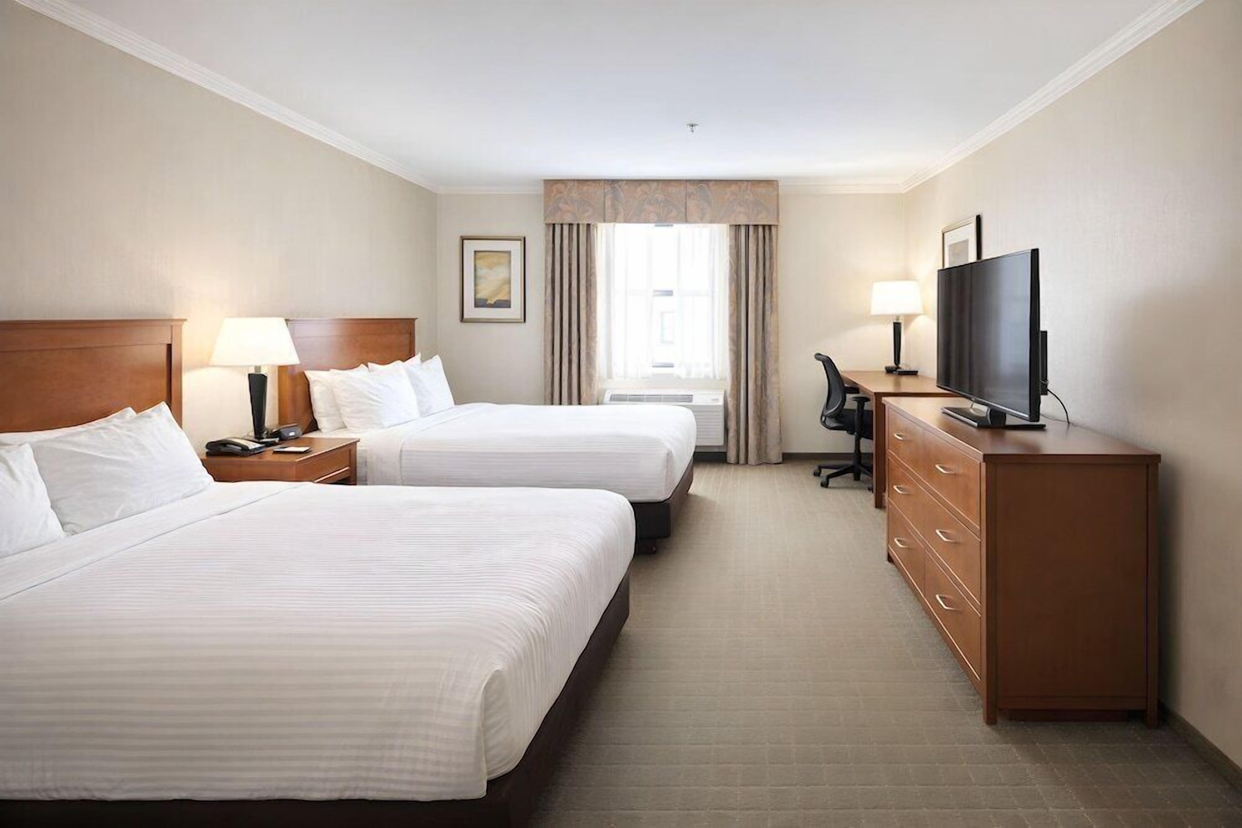 Pillowtop beds, desk, laptop workspace, iron/ironing board