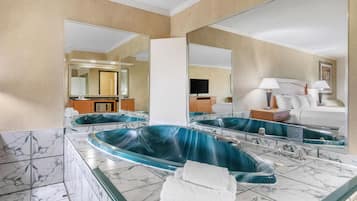 Suite, 1 King Bed, Non Smoking, Jetted Tub | Pillowtop beds, desk, laptop workspace, iron/ironing board