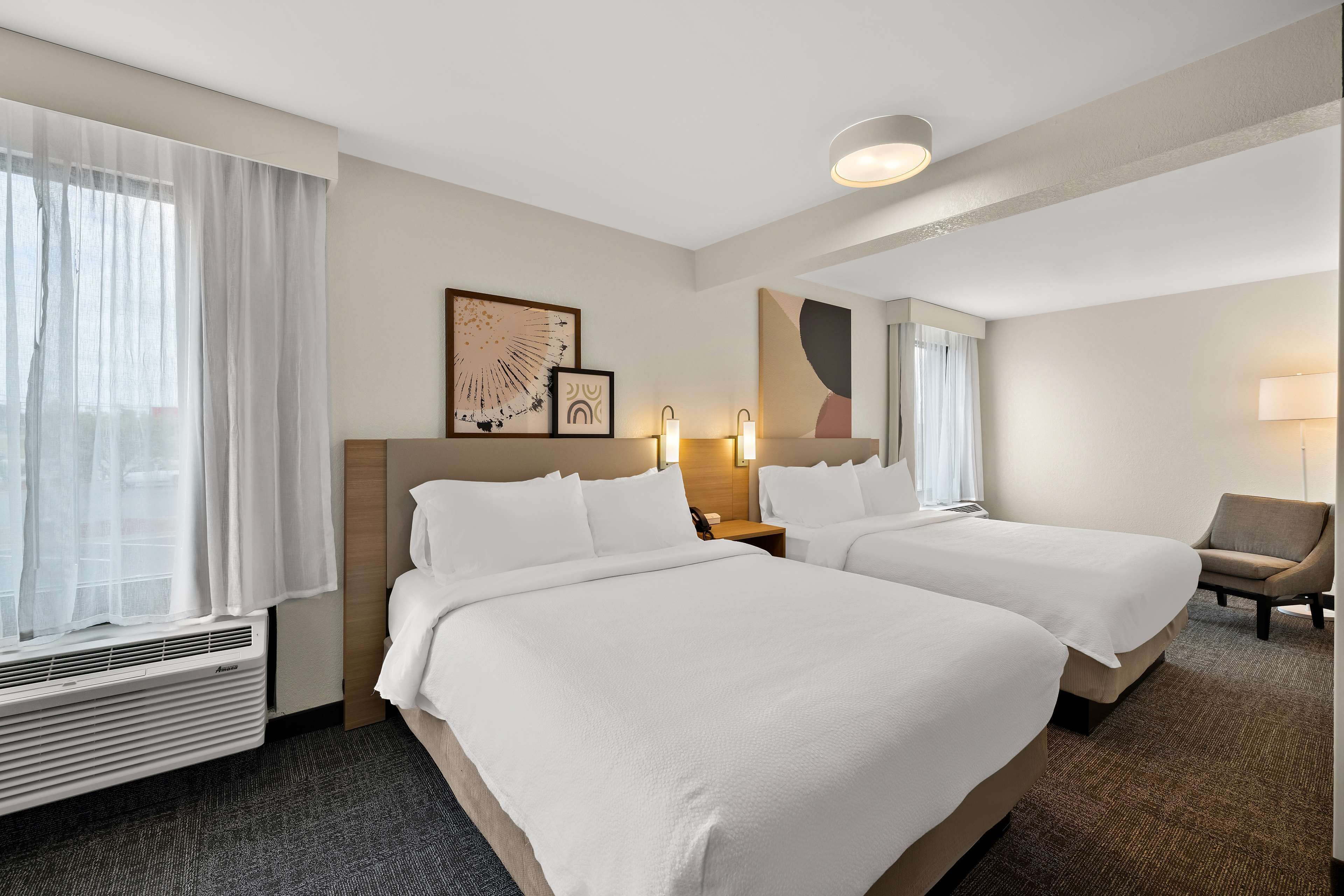 room, 2 queen beds (with sofa) | desk, blackout curtains, iron/ironing board, free cots/infant beds