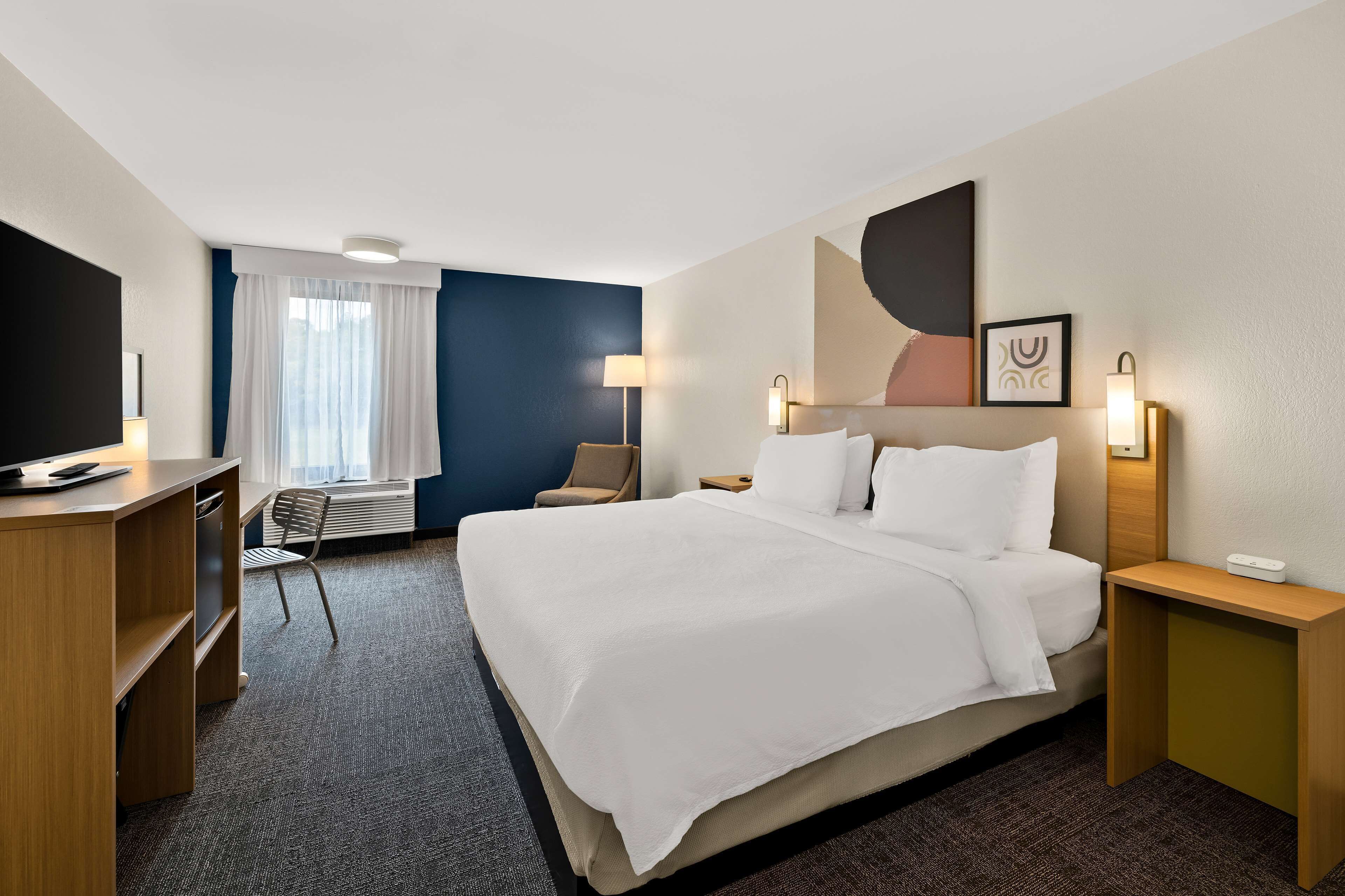 room, 1 king bed | desk, blackout curtains, iron/ironing board, free cots/infant beds