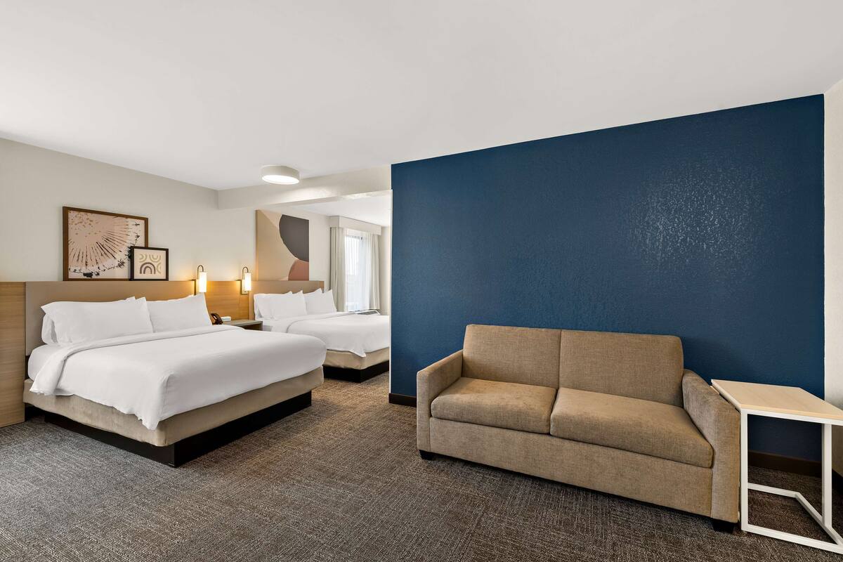 room, 2 queen beds (with sofa) | living area | 32-inch flat-screen tv with cable channels, tv