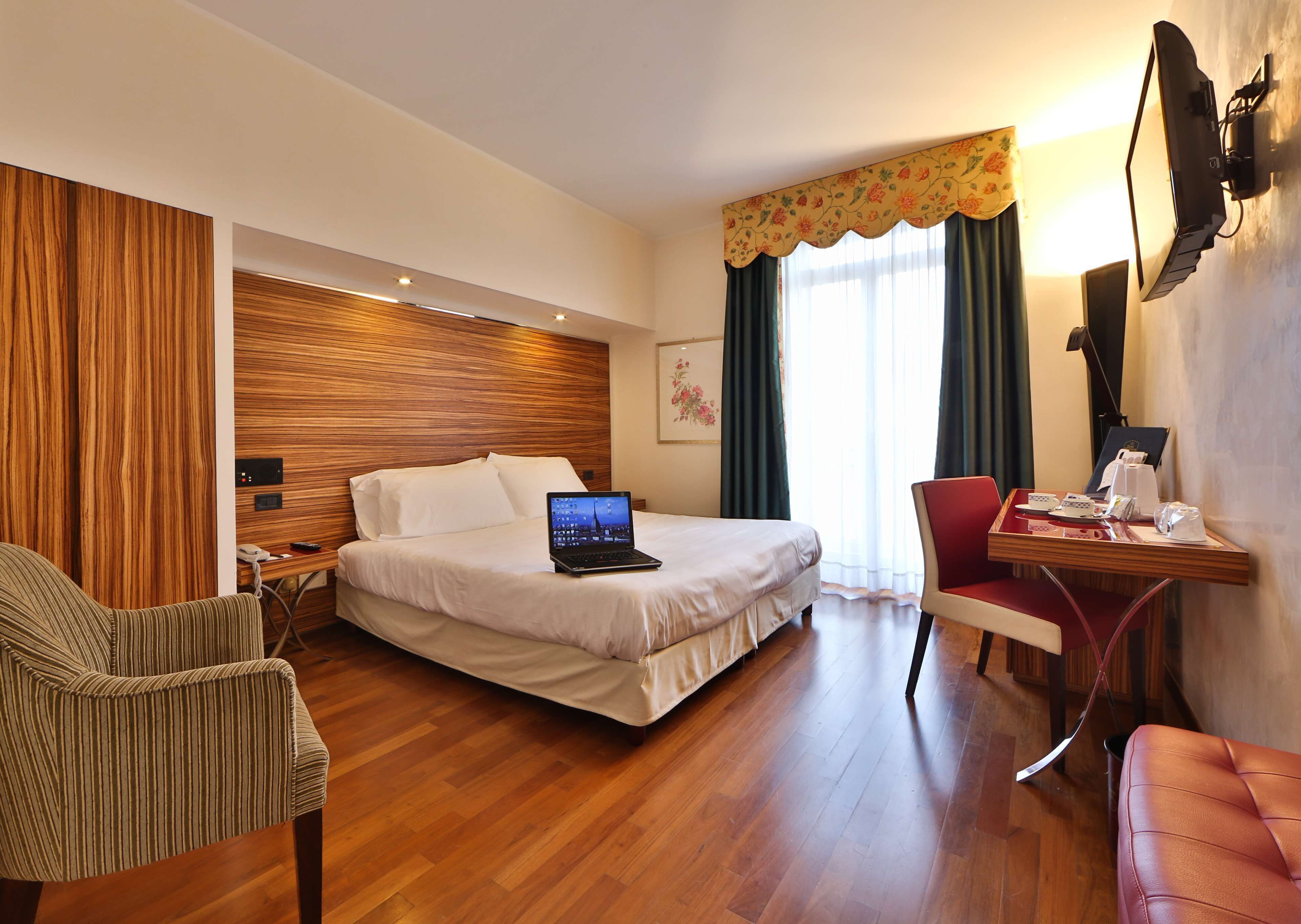 Hypo-allergenic bedding, down duvets, minibar, in-room safe