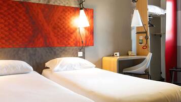 Desk, blackout curtains, soundproofing, free cots/infant beds