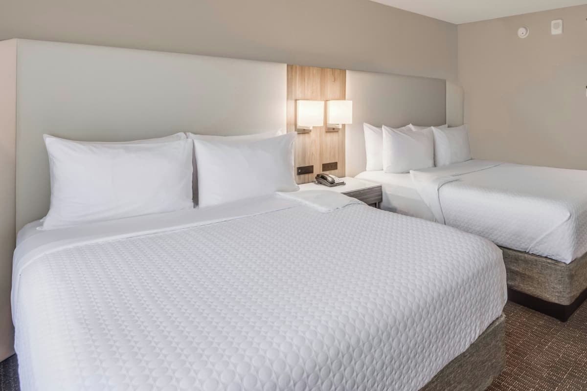 Premium Suite, 1 Bedroom, Non Smoking | Premium bedding, desk, laptop workspace, iron/ironing board