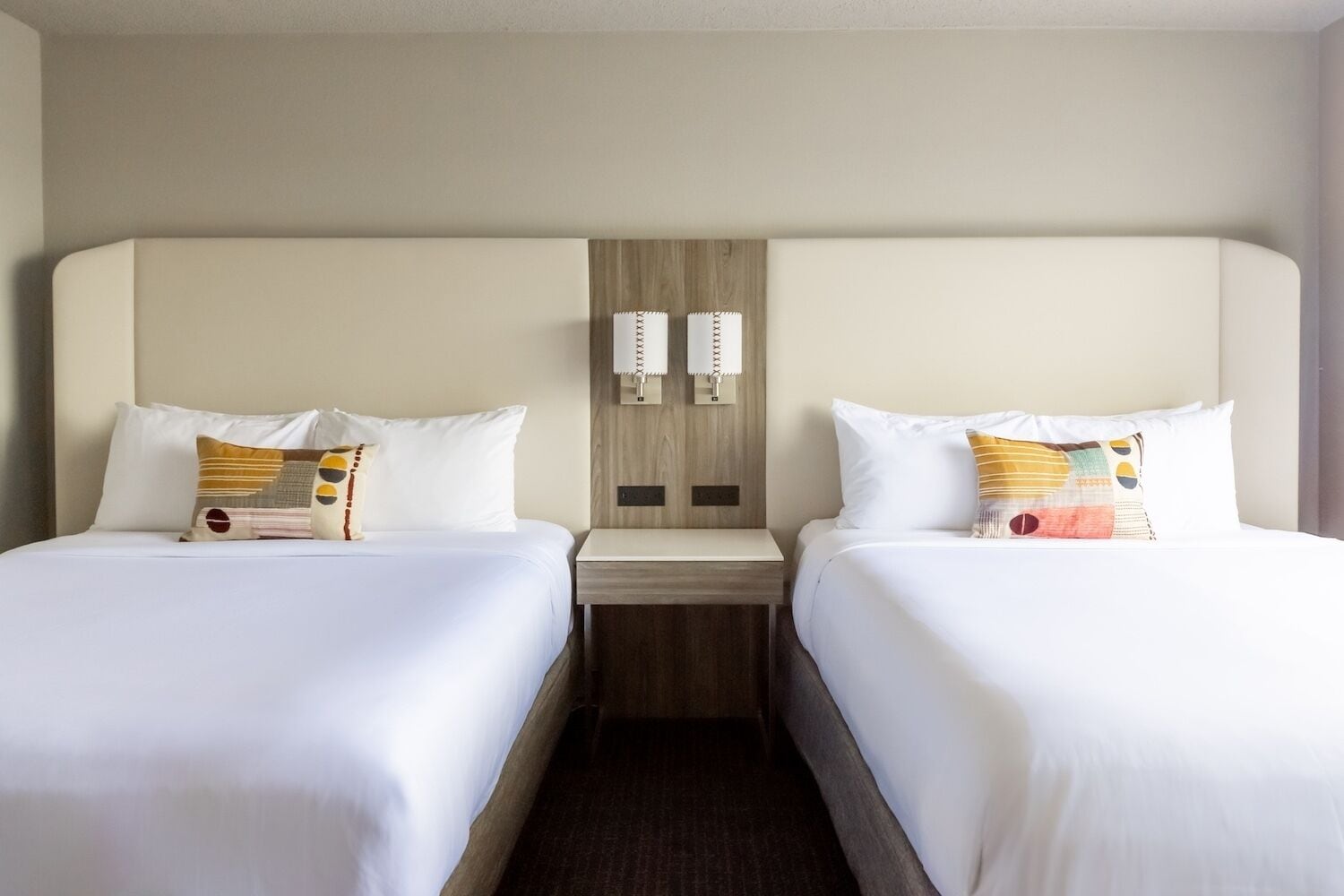Premium bedding, desk, laptop workspace, iron/ironing board