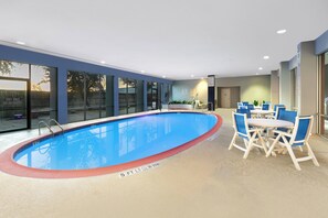 Indoor pool, open 6:00 AM to 10:00 PM, pool loungers