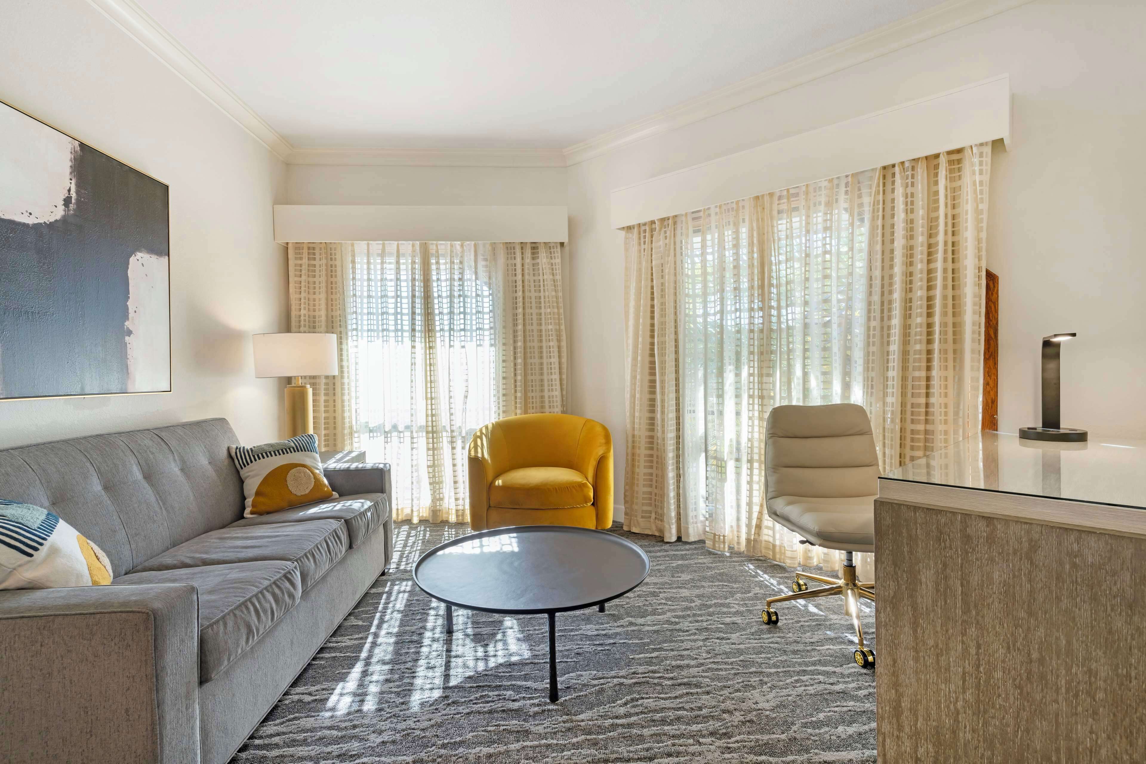 deluxe room, 1 king bed, non smoking, refrigerator (shower only) | desk, laptop workspace, iron/ironing board, free cots/infant beds