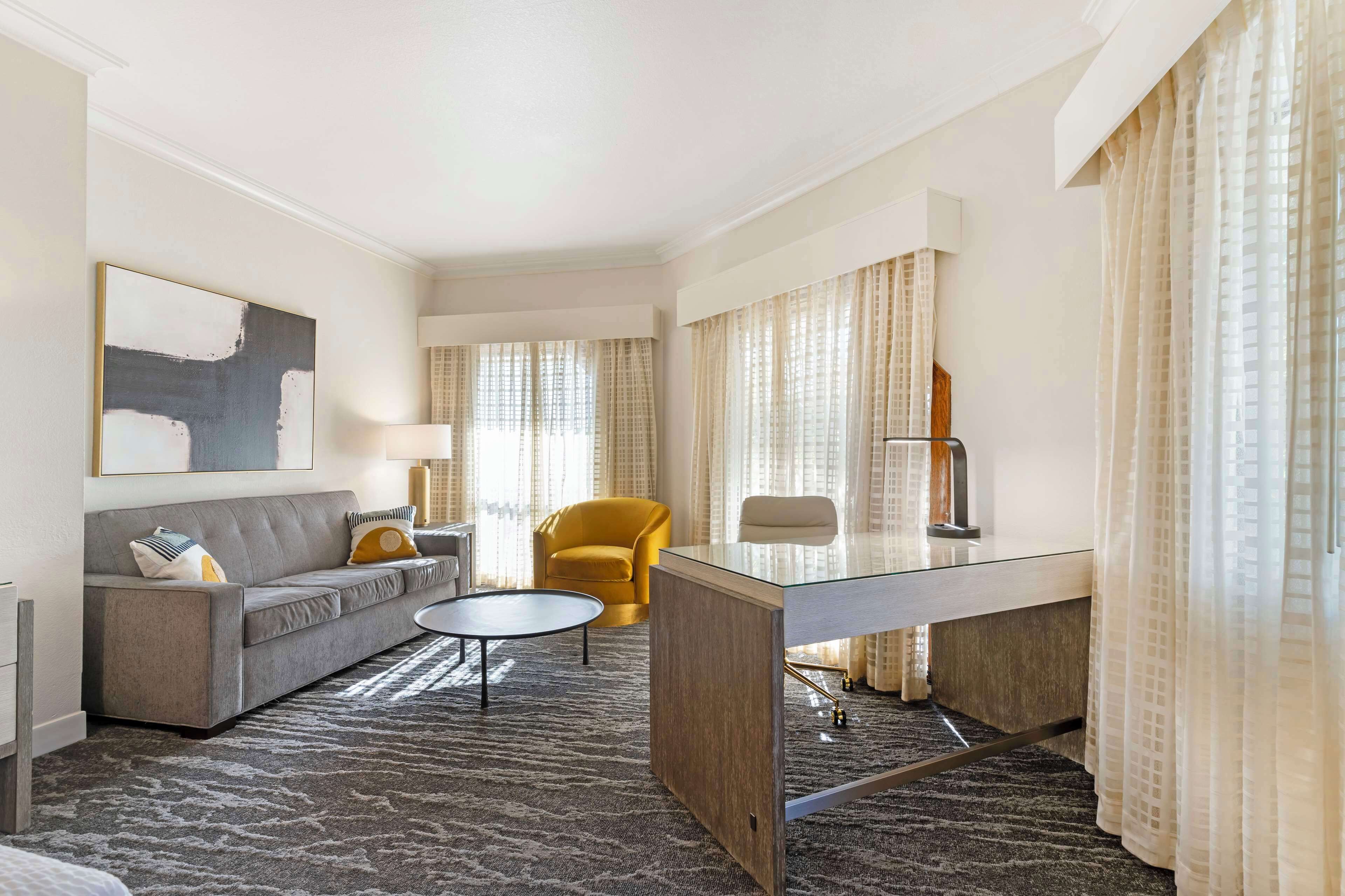 deluxe room, 1 king bed, non smoking, refrigerator (shower only) | desk, laptop workspace, iron/ironing board, free cots/infant beds