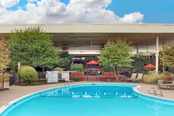 Outdoor pool, open 9:00 AM to 9:00 PM, pool loungers