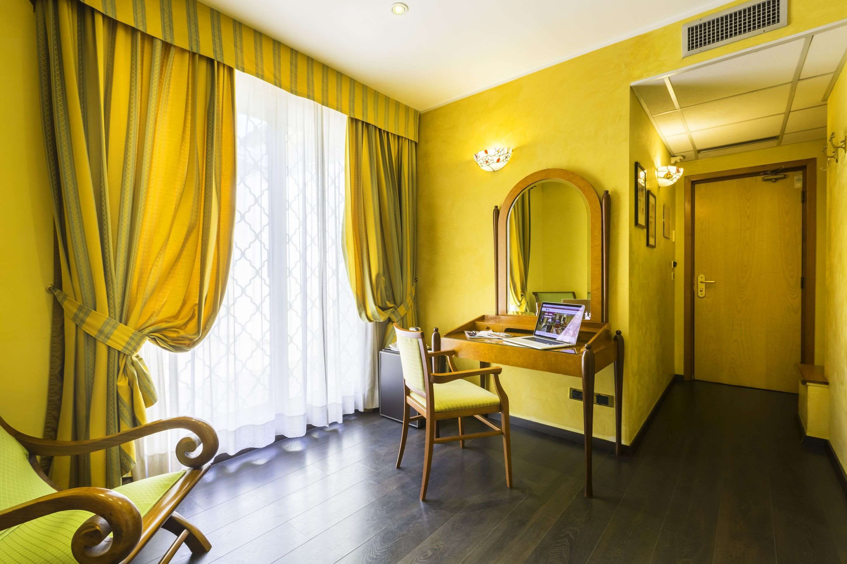 family room, multiple beds | 1 bedroom, minibar, desk, rollaway beds