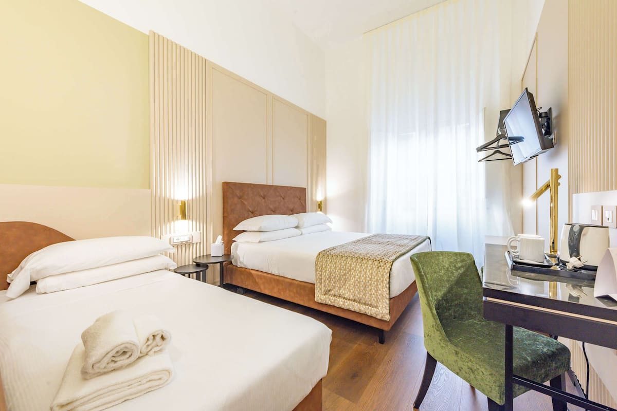 Standard Triple Room, Multiple Beds | Minibar, desk, rollaway beds, free WiFi