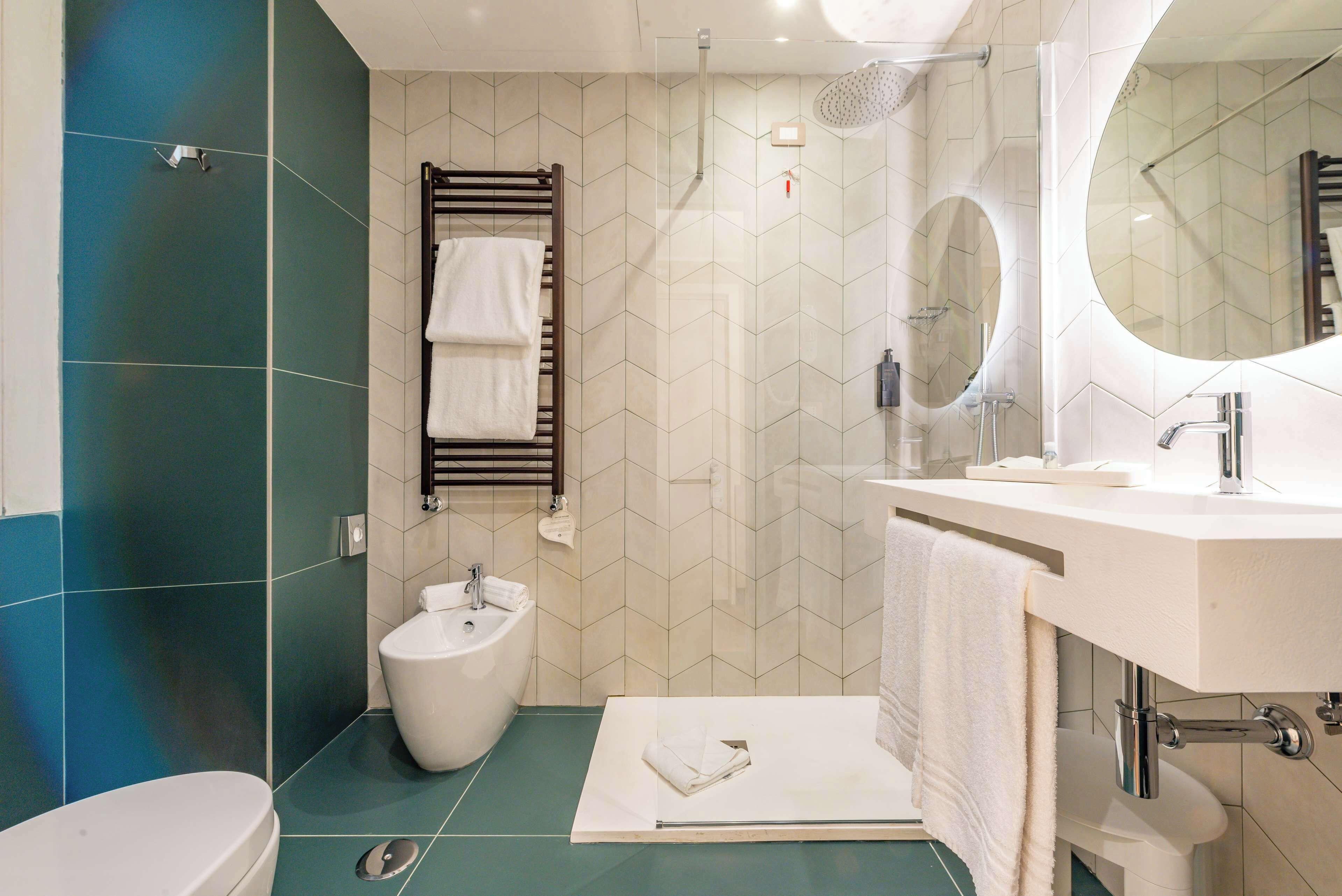 standard triple room, multiple beds | bathroom | combined shower/bathtub, hair dryer, bidet, towels