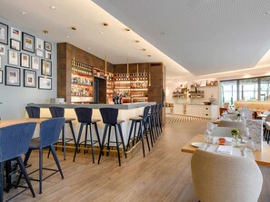 Breakfast, lunch served; international cuisine, al fresco dining