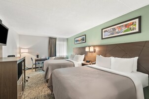 Standard Room, 2 Queen Beds, Non Smoking | Desk, blackout drapes, iron/ironing board, free cribs/infant beds