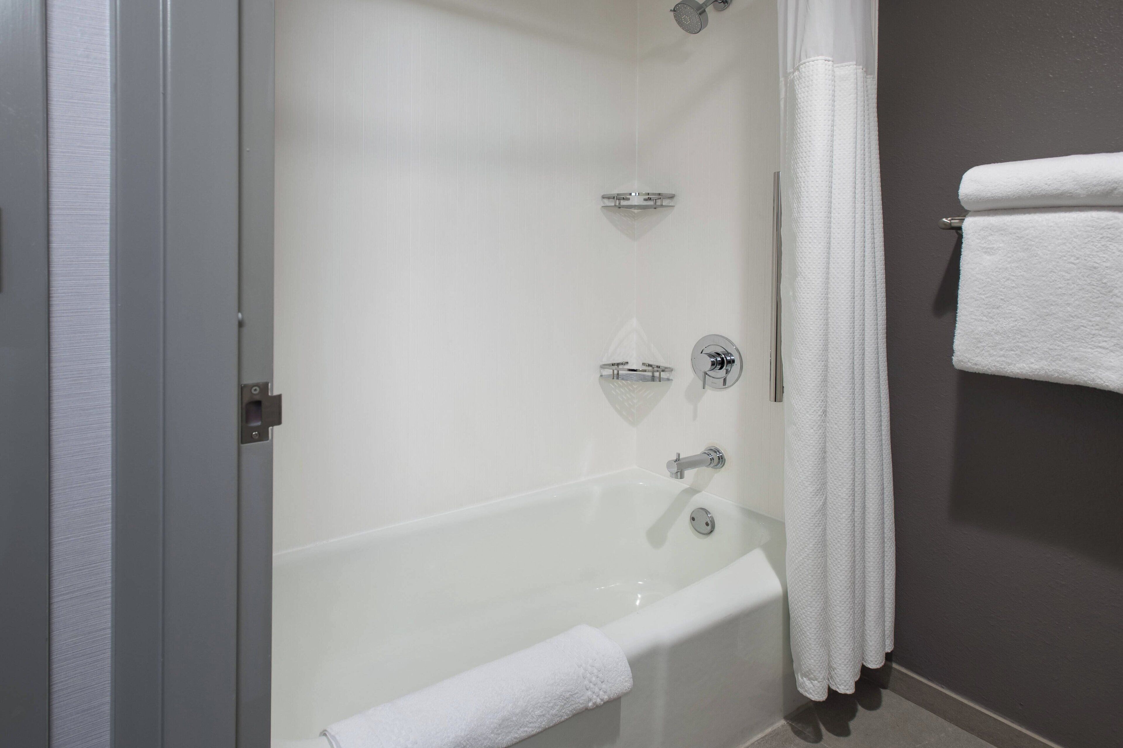 combined shower/bathtub, free toiletries, hair dryer, towels