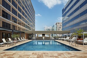 Outdoor pool, open 9 AM to 10 PM, free cabanas, sun loungers