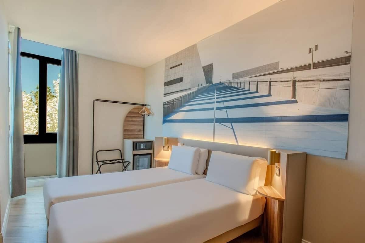 In-room safe, desk, blackout drapes, free cribs/infant beds